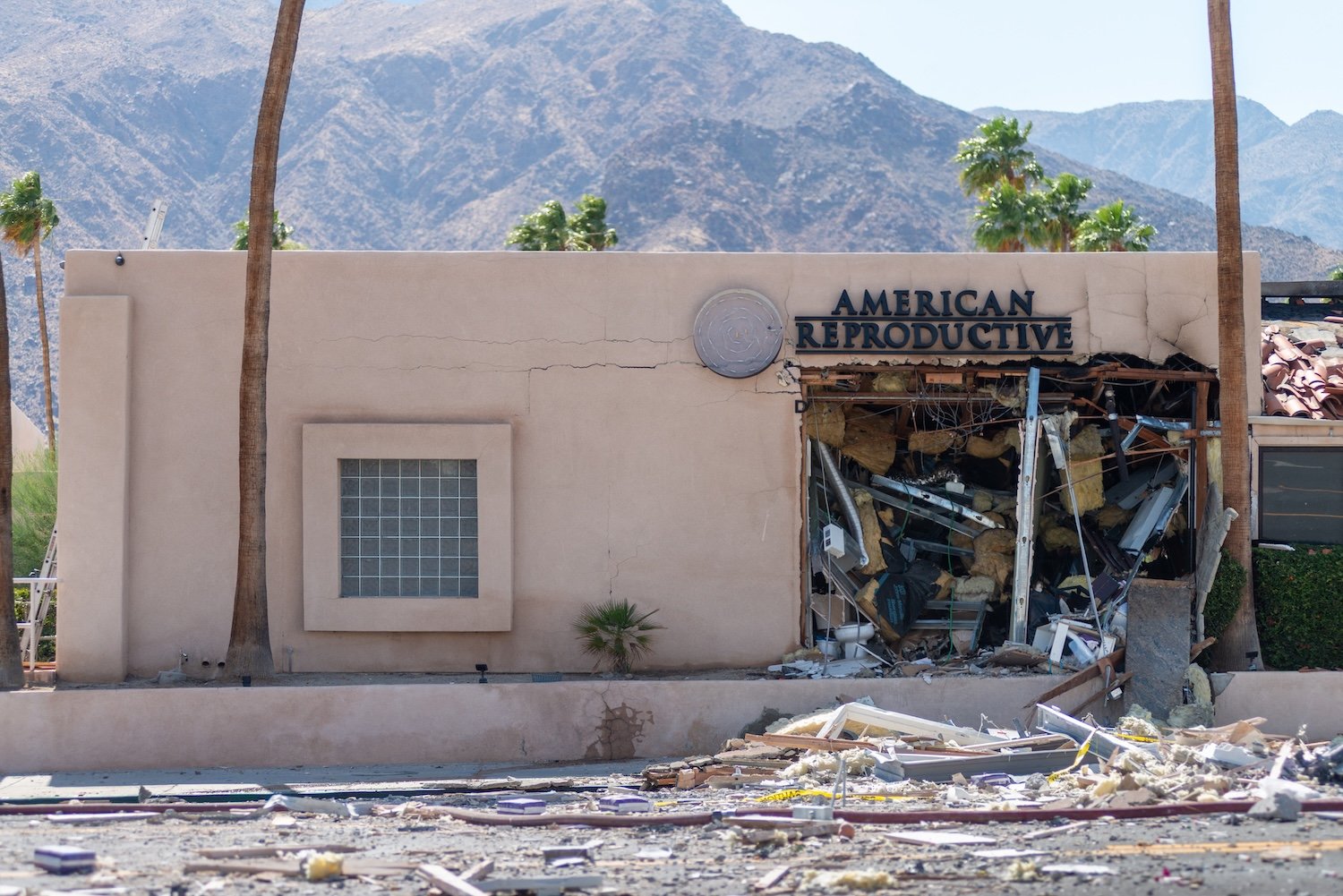 Debris is seen outside a damaged American Reproductive Centers fertility clinic after a bomb blast outside the building in Palm Springs, California, on May 17, 2025.